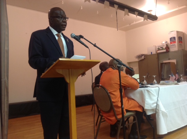 Liberia's Ambassador to the United States, H.E. Jeremiah Solonteh addresses compatriots during the Town Hall Meeting in the Washington D.C. area