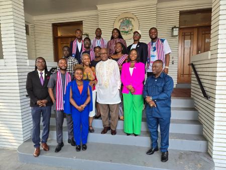 Mandela Fellowship Students pose with Ambassador Dowana in front of Embassy